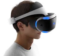 Boy wearing a playstation VR headset image description