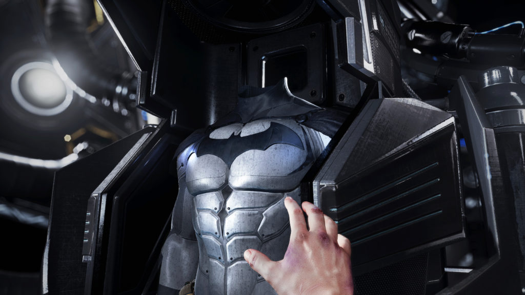 hand reaching out to batman arkham costume 
