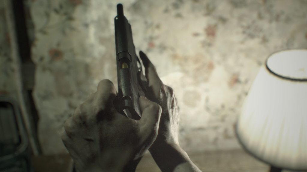 person preparing to shoot a gun in resident evil 7 biohazard