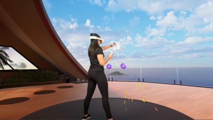 female player standing in vr world wearing headset