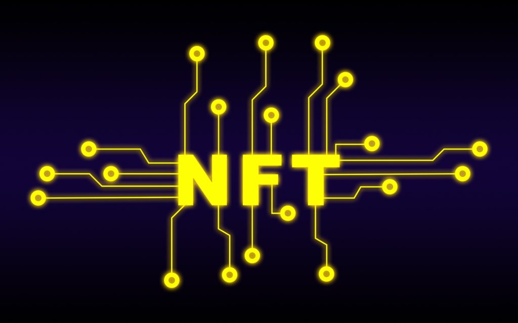 NFT in yellow capital letters