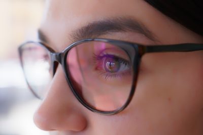 close up of woman with eyeglasses