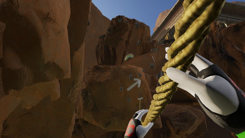 player crossing rock formations through a rope in adventure climb vr