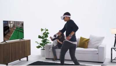 Man playing VR via TV Oculus Casting