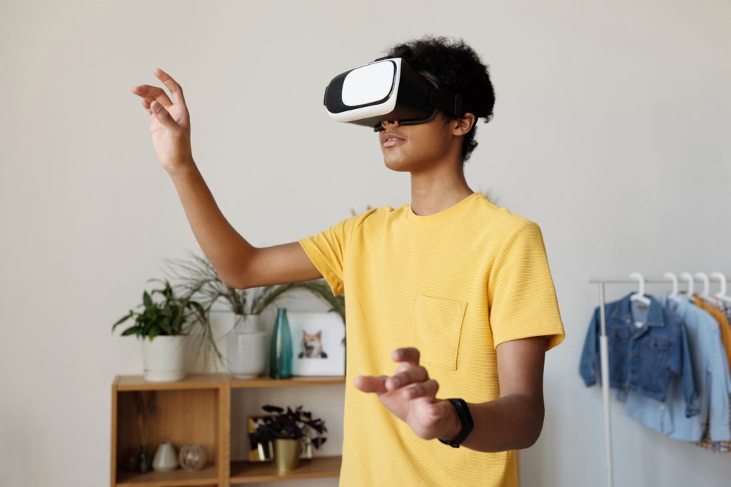 teenage boy using vr headset