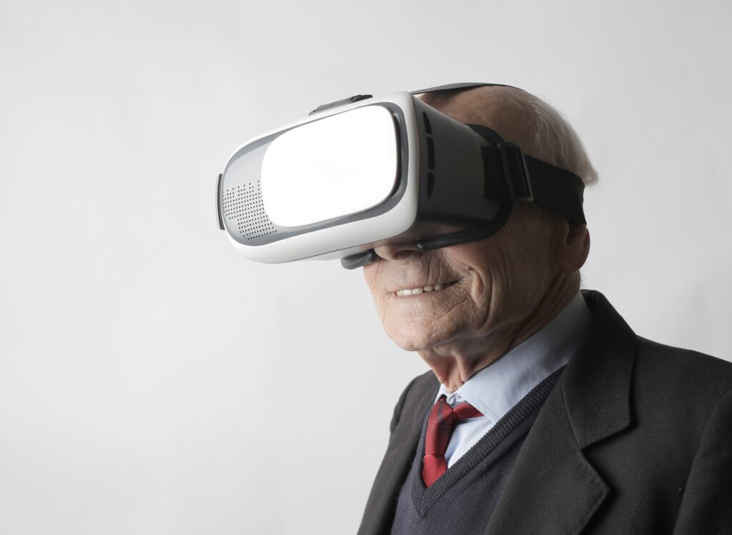 happy elderly man wearing vr headset