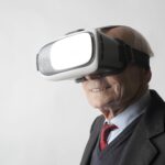 happy elderly man wearing vr headset