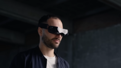 man wearing bigscreen beyond vr headset