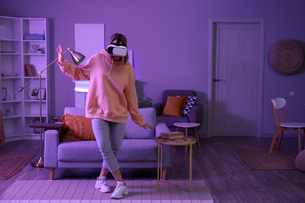 young woman in vr glasses at home Full-Body Tracking in VR